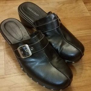 Black studded faux leather clogs
